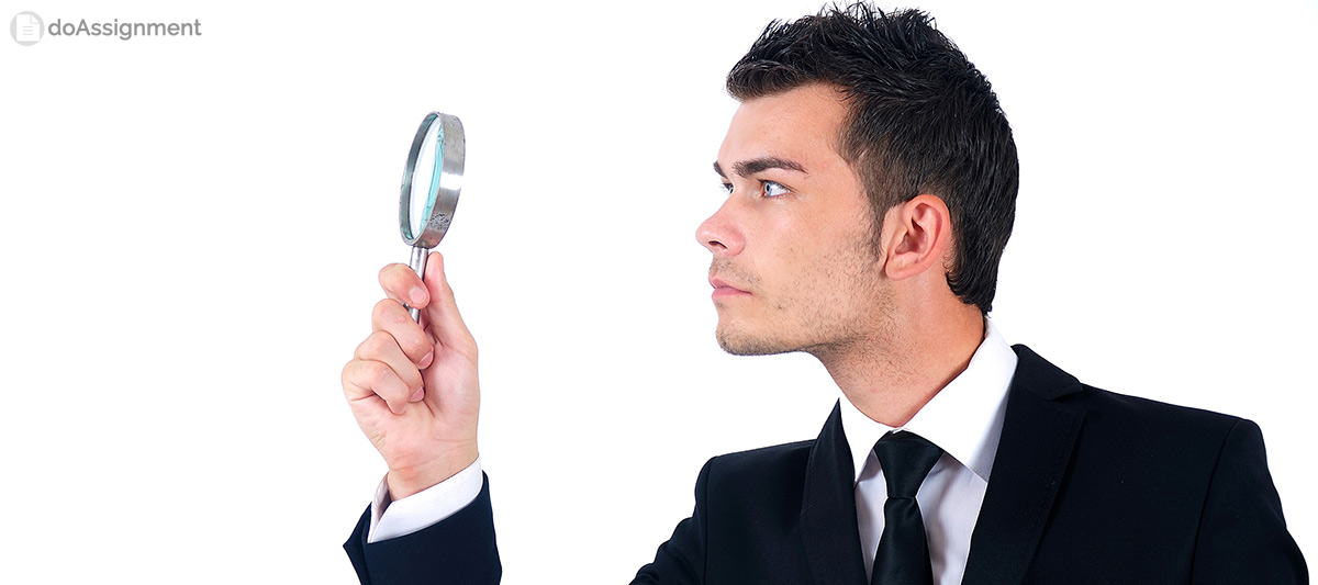 man with magnifying glass